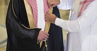 A Bisht Is A Traditional Arabic Men S Cloak Popular In Arabia And The Essential Item For Any Gentleman S Wedding Arab Wedding Wedding Logo Design Riyadh