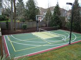 Pickleball It S A Seattle Thing And Basketball Court Combo With Lighting Pretty Drea Basketball Court Backyard Home Basketball Court Tennis Court Backyard
