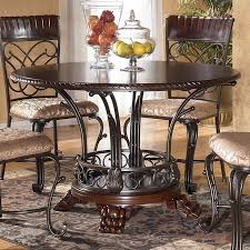Ashley furniture signature design marble coffee table. Alyssa Round Dining Table Signature Design By Ashley Furniture Furniturepick
