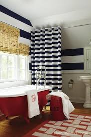 This bathroom by jennifer worts also features a beveled mirror for extra reflection and an acrylic stool for a touch of modern style. Black And White Bathroom Ideas With Shower Curtains Novocom Top
