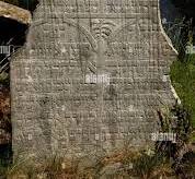 This ancient headstone is among about 12,000 monuments ...
