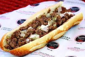 I've mentioned my obsession with philly cheesesteaks here before. The Tasty History Of The Philly Cheesesteak