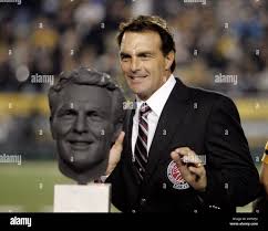 Doug Flutie Reacts After His Canadian Football Hall Of Fame Bust Is Unveiled On The Field During The Hamilton Tiger Cats And Winnipeg Blue Bombers Cfl Football Game In Hamilton September 19 2008