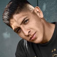 The ufc lightweight championship once and the bellator lightweight world championship twice. Edson Alvarez Facebook