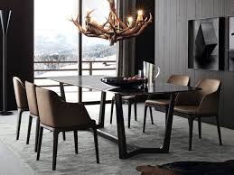 Great room anchored by the large fireplace with large sliding glass doors that open up to the outside patios. 20 Luxury Dining Tables For The Modern Dining Room In 2021 Dining Room Design Marble Top Dining Table Luxury Dining Tables