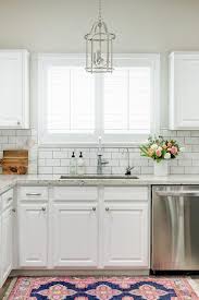 Check spelling or type a new query. White Kitchen With White Granite Countertops And Pink And Blue Rug Transitional Kitchen Behr Silver Drop
