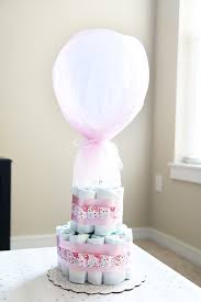 Every diaper baby shower needs a diaper cake! Diaper Cake Baby Shower Centerpieces Abby Lawson