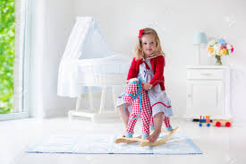 Maybe you would like to learn more about one of these? Les Enfants Jouent A L Interieur Enfants Equitation Jouet Cheval A Bascule Petite Fille Jouant A La Garderie Ou A La Maternelle Belle Creche Pour Bebe Et Enfant En Bas Age Jouets Pour