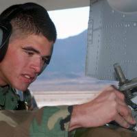 US Air Force (USAF) STAFF Sergeant (SSGT) Randal Brooks and AIRMAN First  Class (A1C) Joshua Shepard, 57th Aircraft Generation Squadron, uses a  loading cart to transport a wing fuel tank during a