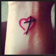 Matching heart outline temporary tattoo. 60 Phenomenal Cross Tattoos On Wrist