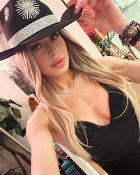 Cleaning today and sorting all my stage clothes which has been exhausting  .. I think I should keep this one .. hats guitars crystals and Nikes are my  thing and I need help 😂