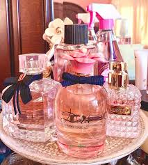 Three green and pink bottles on black textile. Pink Perfume Bottle Explore Tumblr Posts And Blogs Tumgir