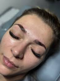 Removing red wax stain from car headliner?