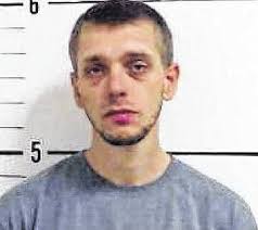 Five charged after home search