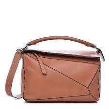 We did not find results for: Loewe Calfskin Medium Puzzle Bag Tan 659117 Fashionphile