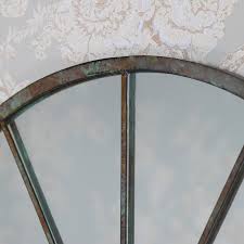 On a bare wall, these arched mirrors serve as a focal point and when used in smaller designs and sizes, they can create a beautiful wall collage. Rustic Wall Mounted Arched Window Mirror 49cm X 77 5cm
