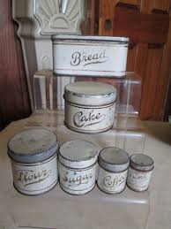 These vintage kitchen dinette sets are gorgeous, but classical, inspiring thoughts of 56' corvettes and sock hops, you kitchen will feel like a malt shop. Vintage Child S Tin Canister 12 Pc Set Circa 1940 S Metal Package Co N Y Usa Childrens Kitchens Vintage Kitchen Toy Kitchen