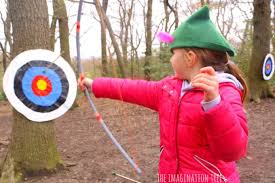 Because our helpers are only three and six, we helped them out by taping a little indicator for where the back of the arrow should fit into the string. Diy Bow And Arrow For Kids The Imagination Tree