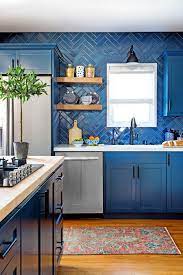 The bold and rich color really complements the brass faucet and cabinet hardware. 55 Best Kitchen Backsplash Ideas Tile Designs For Kitchen Backsplashes