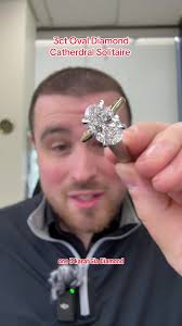 Two Tone Oval Cathedral Engagement Ring