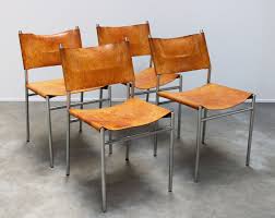 Set of 6 dining chairs, leather and elm, france, 1960s, these french dining chairs are featured in absolutely gorgeous cognac leather. Set Of Four Cognac Leather Se06 Dining Chairs By Martin Visser For Spectrum 1960 105578