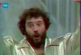 Joe Dassin and Carlos perform a comical number together. Carlos sings “The  bougalou of the werewolf". Joe is disguised, wearing a wolf animal costume.  He sings and plays the saxophone. Joe is so cute ...