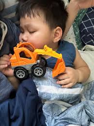 Where in Rochester, NY can kids play with construction trucks and equipment?