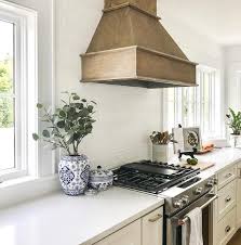 To make it a little with such a statement hood, interior designer emil dervish decided to forgo upper cabinets—this. Off White Kitchen Cabinets Design Ideas