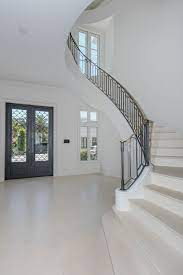 Neoclassical In Miami Beach Re Lists For Just Under 30m House Entrance Staircase Styles Luxury House Designs