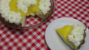 My mother rising early in the morning to prepare good ole 'tom'. Lemon Supreme Pie