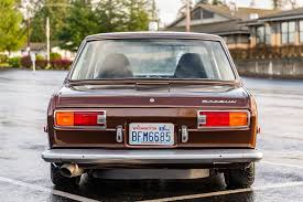 Image result for Gold Bronze 1958 Datsun