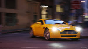 Image result for Sunburst Yellow 2012 Aston Martin