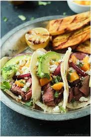 Top the tortillas with fish, mango salsa, shredded red cabbage, sliced avocado, and cilantro. Grilled Steak Street Tacos Recipe Easy Mexican Street Tacos Recipe