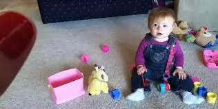 Adorable Scenes As Baby Laughs Hysterically As Her Pet Dog Catches Bubbles Daily Mail Online
