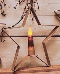 The mesh shelf and three hooks can hold tissue paper, an air freshener, a small potted plant and so much more. Buy Whimsical Hanging Stars Candle Holder Measuring 8 1 2 X 9 1 4 In Three Of Black Burgundy And Ivory Holds 4 Led Battery Operated Taper Candles Candles Are Not Included Ivory Online At