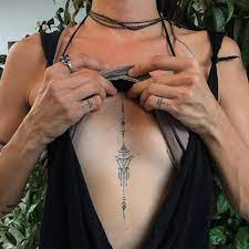 10 Things No One Tells You About Getting A Sternum Tattoo Chest Tattoos For Women Jewelry Tattoo Sternum Tattoo