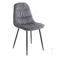 The specific technique used for cutting this. Novita Chair Fluffy Grey