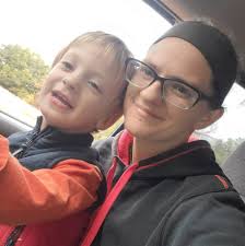 What is the meaning of this wooden base with boots and a top hat?