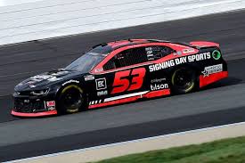 After receiving sponsors, how do you but them on your car? 53 James Davison Signing Day Sports Chevrolet Sport Chevrolet Nascar Racing Indy Car Racing