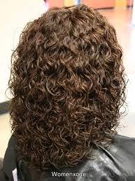 A short hair perm is a women's short hairstyle that is done by setting the hair in waves or curls and treating it with a perm solution to make the style last for months. Wash And Wear Hair Perms Curls To Straight Hair Perm Hairstyle Medium Length Hair Styles Permed Hairstyles Short Permed Hair