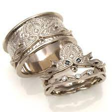 17 Wedding Bands To Blow Your Dude S Mind Updated Offbeat Bride Viking Wedding Ring Wedding Rings Sets His And Hers Celtic Wedding Rings