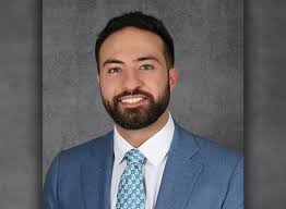 Alumnus Mustapha Hammoud serves Dearborn in two different careers