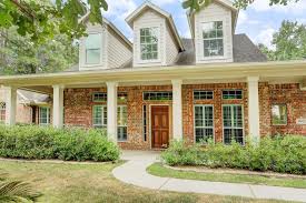 3702 Waterbend Cove Spring Tx 77386 Floor To Ceiling Windows Cape Cod House House Styles
