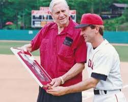 Image result for Red 1990 Sports Coach of America