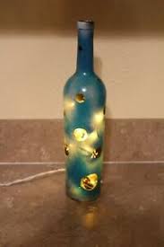 Trova immagini stock hd a tema empty wine bottle led lights inside e milioni di altre foto, illustrazioni e contenuti vettoriali stock royalty free nella vasta raccolta di shutterstock. Handmade Painted Wine Bottle With Lights Inside Plug In Decorative In Outdoor Ebay