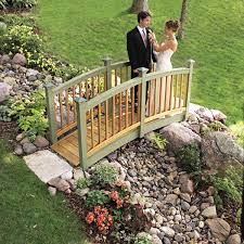 While this bridge is a tad too small to walk over, it does make a really stunning addition to this lush garden. Classic Arched Backyard Bridge Diy Family Handyman