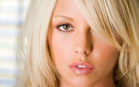 Download Elegant Blond Woman Exhibiting Luscious Lips Wallpaper |  Wallpapers.com