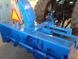 Snowblower on a gravel driveway. Snow Blower And Gravel Driveway