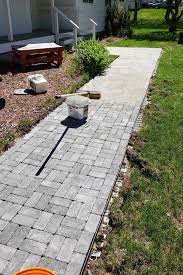 Spread out about 2 of sand over the walk area, then place two 1 pipes on either side of the paving area. How To Create A Diy Paver Walkway Pavers Diy Paver Walkway Diy Diy Paver Walkway