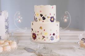 The inherent beauty of flowers makes them an ideal choice for decorations on a cake. Wedding Cake Advice How To Incorporate Edible Flowers Into Your Wedding Cake Design By Dainty Bakes